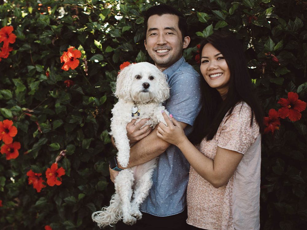 image of dr nishimura with his wife and dog